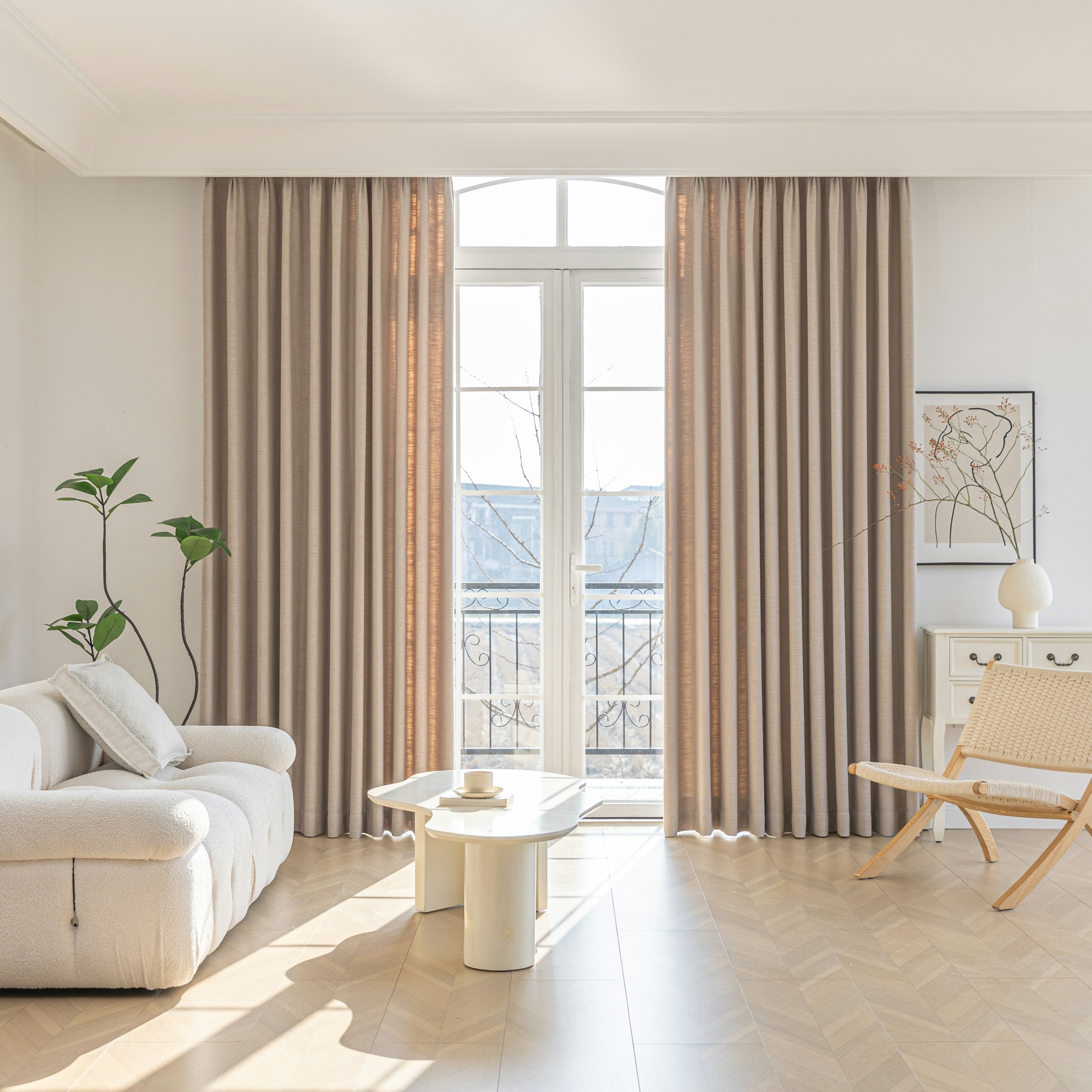 Bright, calm living room in warm neutral tones
